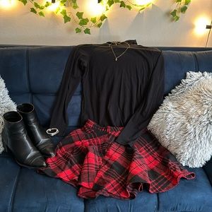 Selling this cute mini skirt! Red/ black plaid pattern.